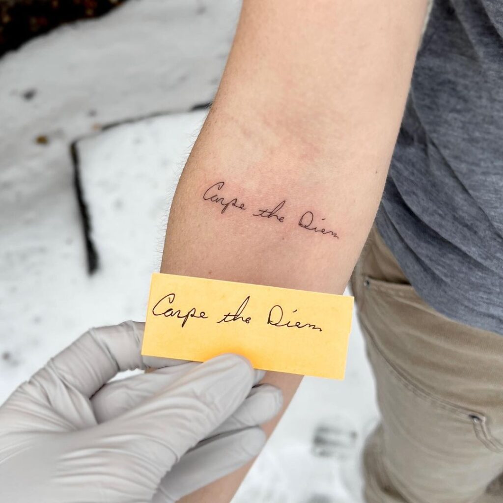 Een "carpe the diem" tattoo