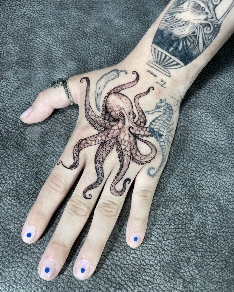Hand octopus tattoo