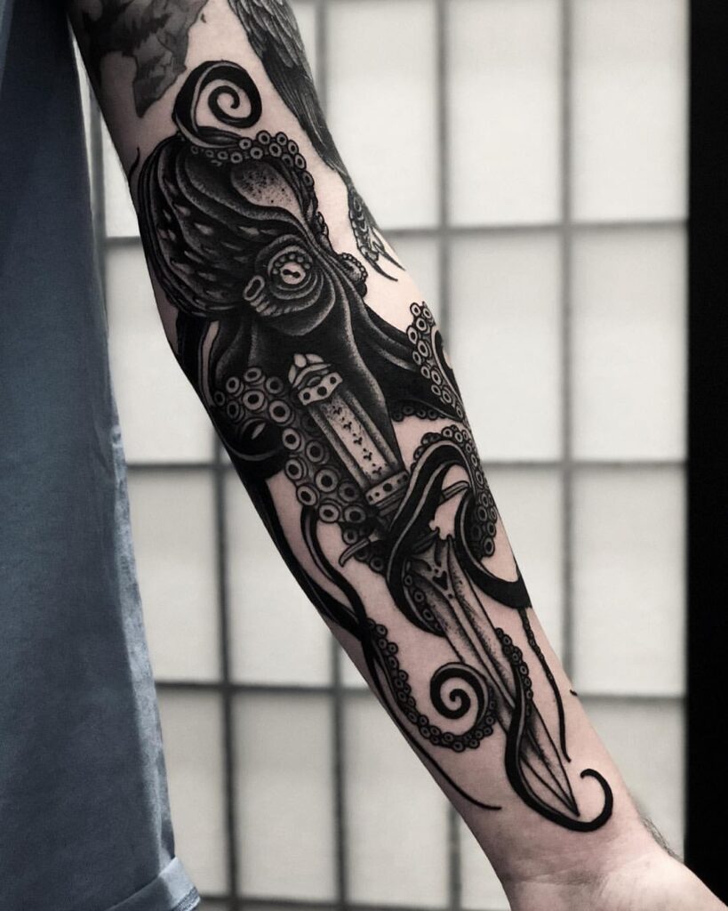 Onderarm octopus tattoo