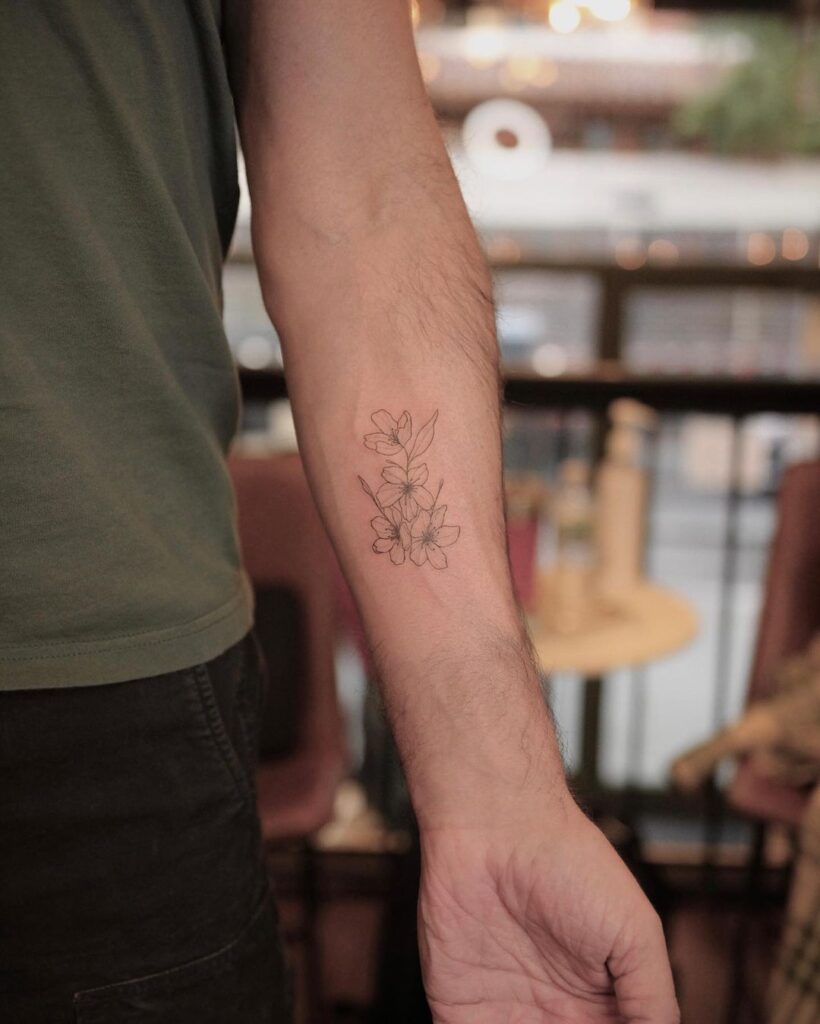 16. Een jasmijn tattoo met fijne lijnen 