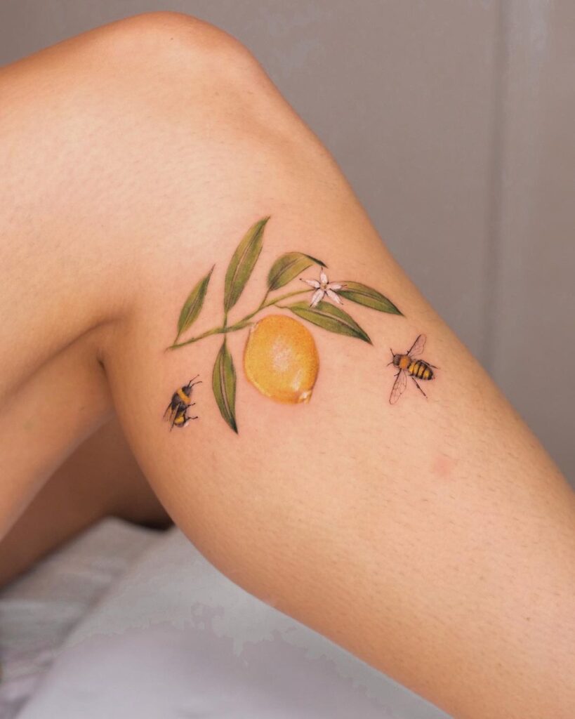 18. Een lemon tattoo op het been