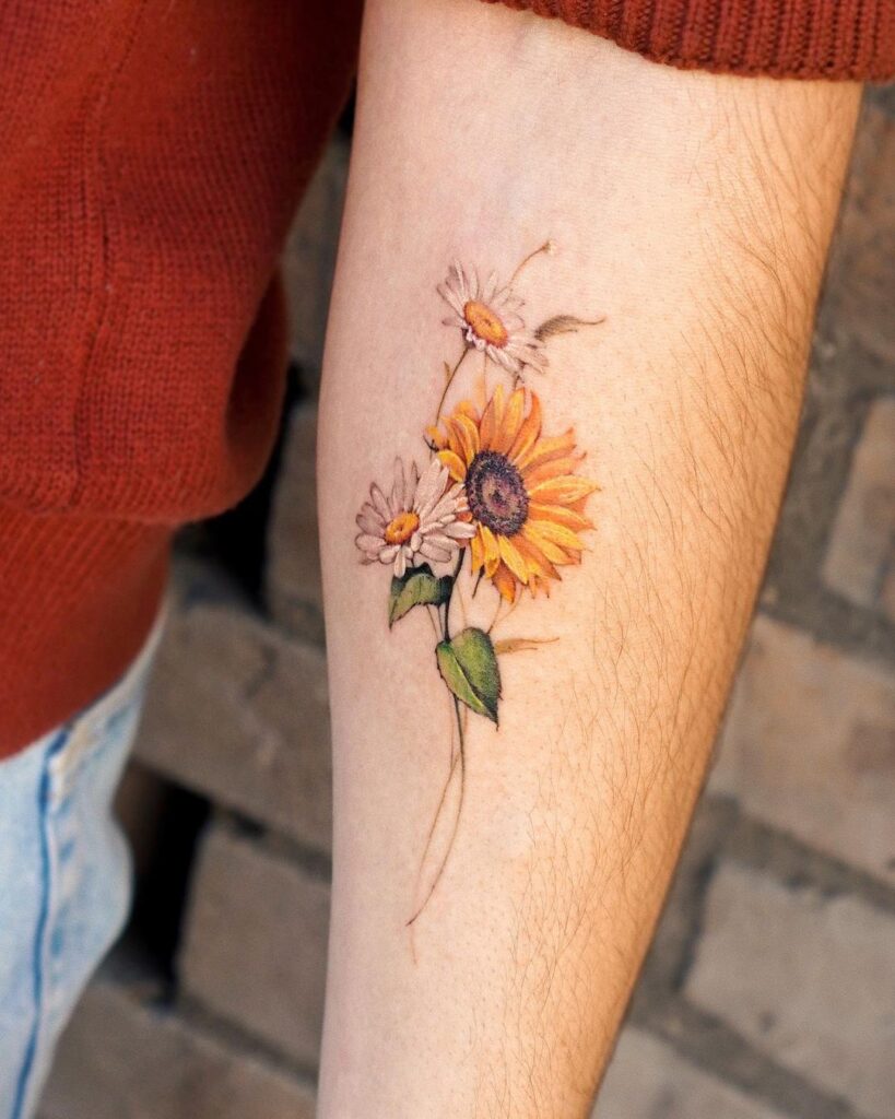 9. Een madeliefje en boeket zonnebloemen tattoo
